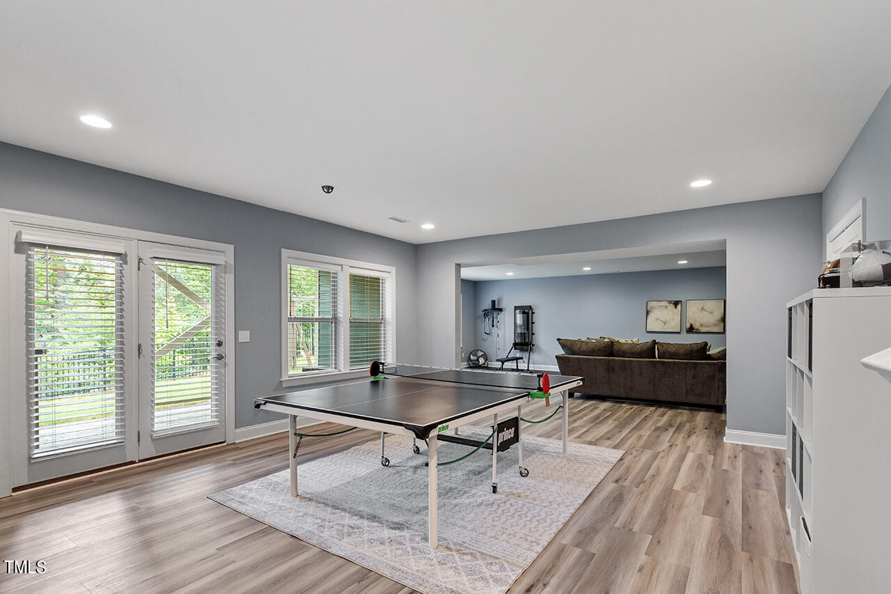 5273 Aleppo Lane Raleigh, NC 27613 - Photo 42 of 56 a living room with a couch and a table