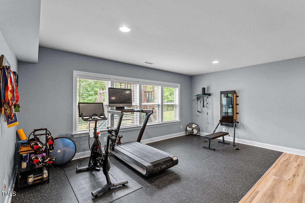 5273 Aleppo Lane Raleigh, NC 27613 - Photo 46 of 56 a view of a room with gym equipment