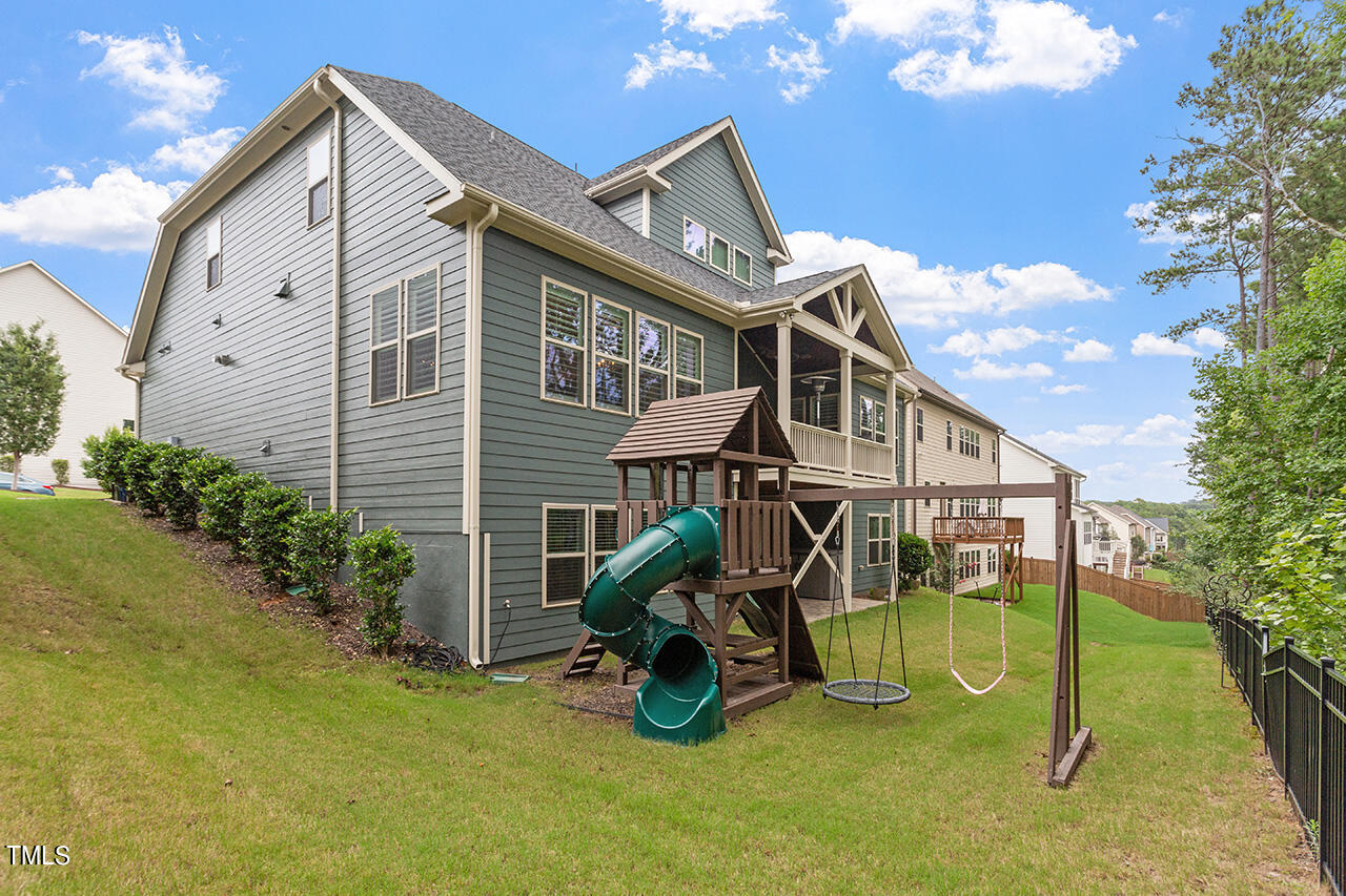 5273 Aleppo Lane Raleigh, NC 27613 - Photo 6 of 56 a view of a house with a yard