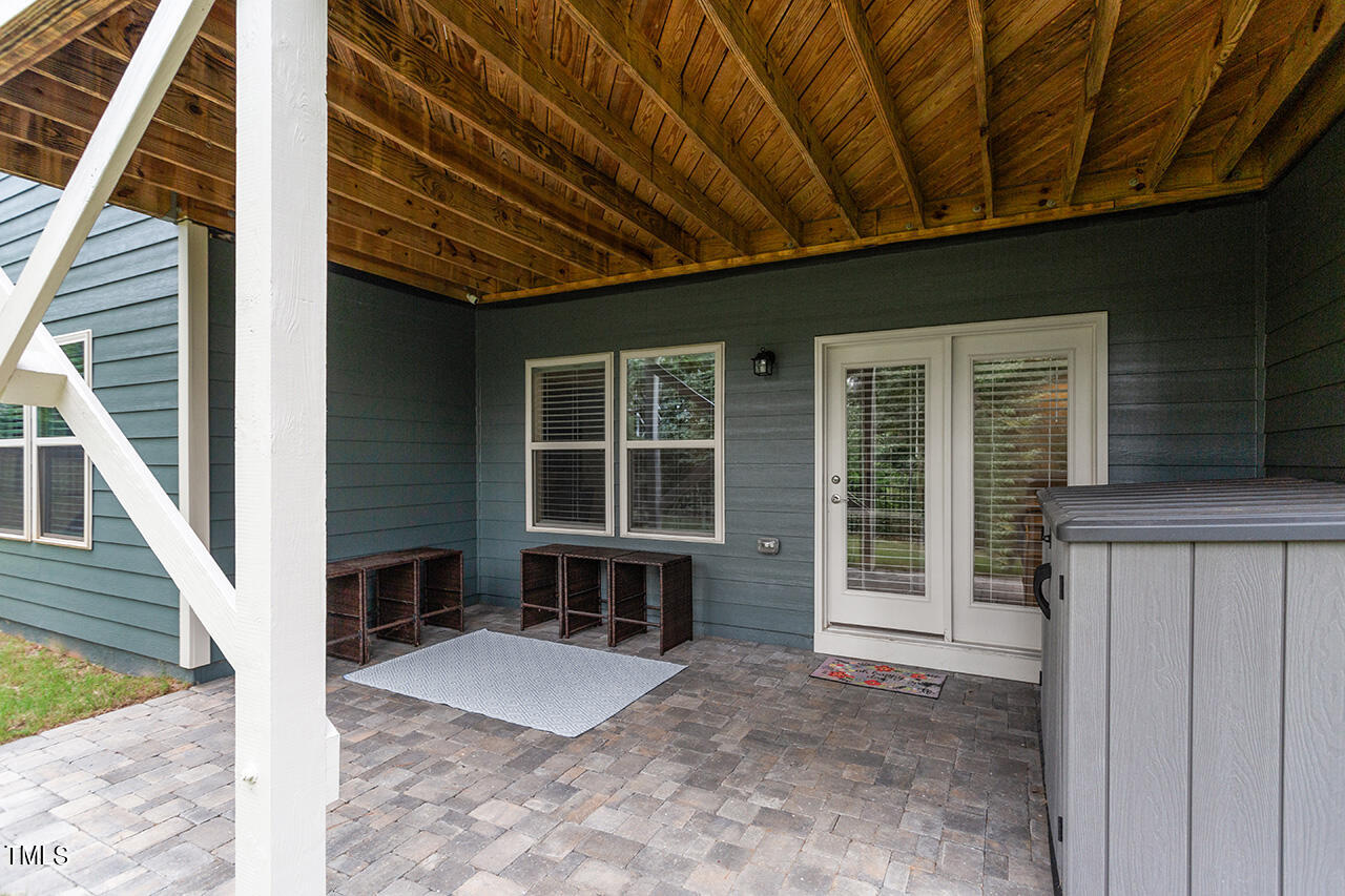 5273 Aleppo Lane Raleigh, NC 27613 - Photo 7 of 56 a front view of a house with a porch