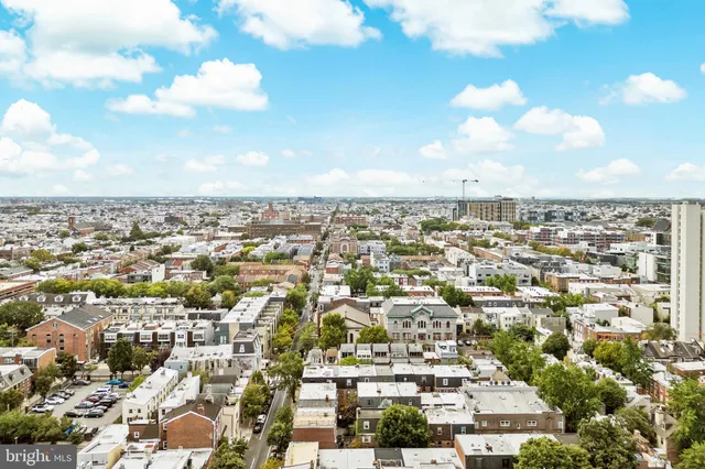 a view of a city with tall buildings