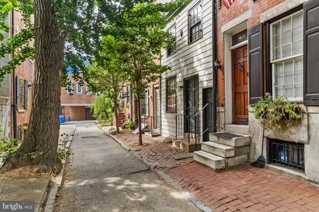 a front view of a house with a patio