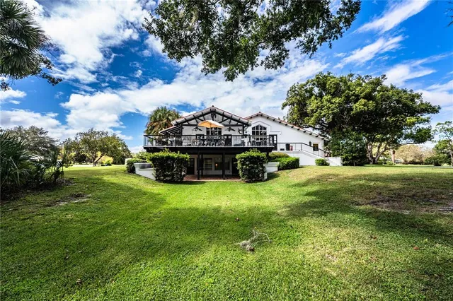a view of yard with swimming pool