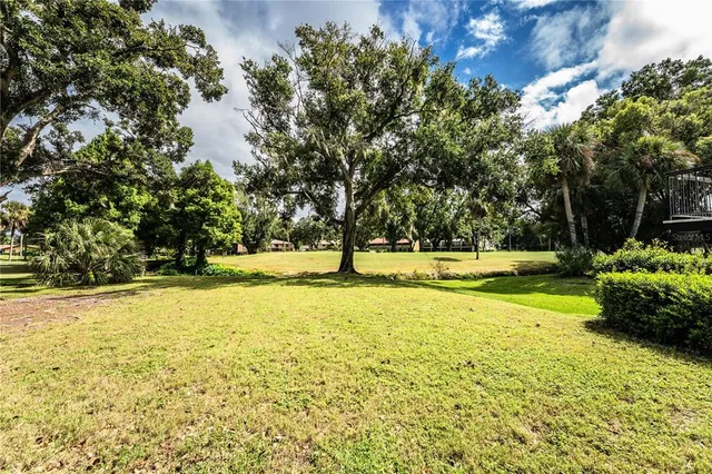 a bathroom with a sink a mirror and a shower