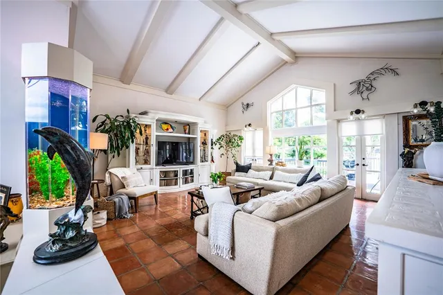 a kitchen with refrigerator a stove a sink and a cabinets