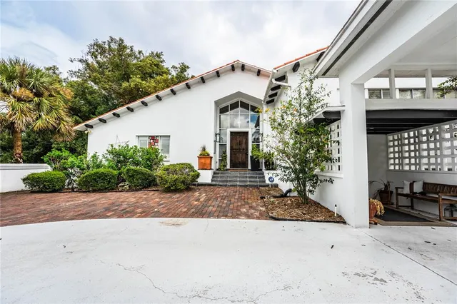 a view of a garden with an ocean view