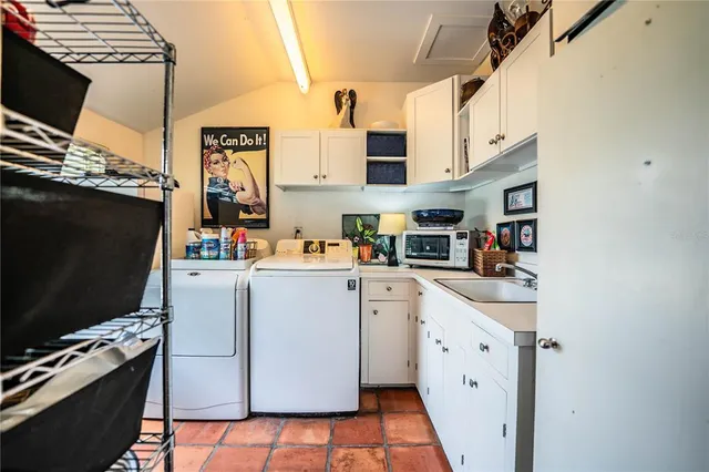 a living room with lots of furniture and a fireplace