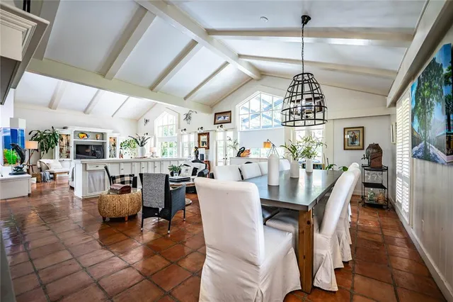 a bathroom with a toilet a sink and a mirror
