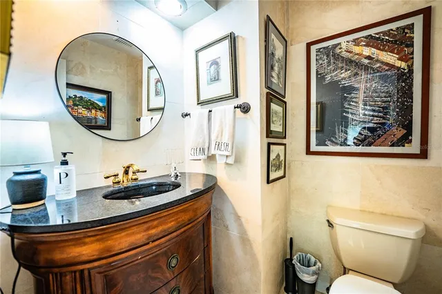 a bathroom with a double vanity sink a mirror and a bathtub