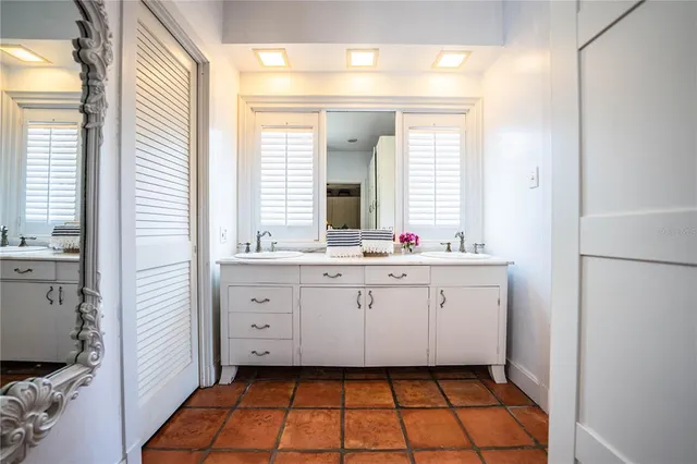 a view of a livingroom with furniture and a flat screen tv