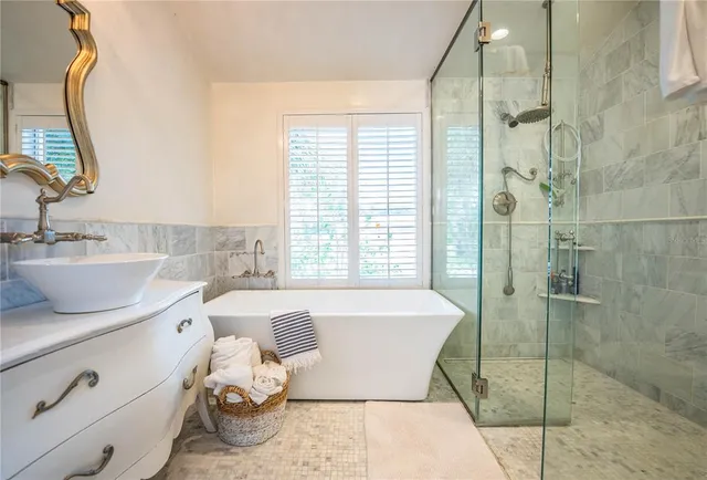 a view of entrance gate of house and car parked