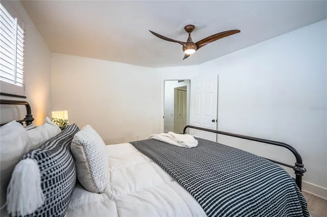 a bathroom with a sink mirror and vanity