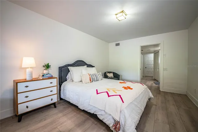 a view of a garage with cars