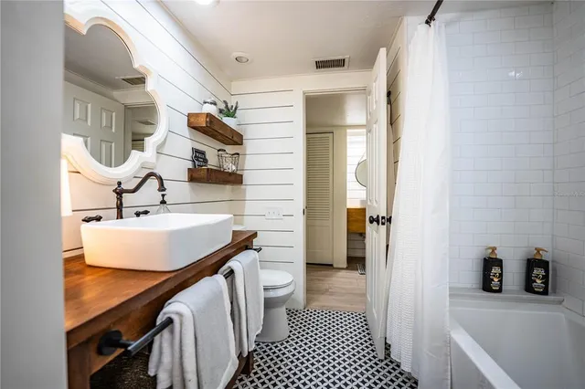 a view of balcony with furniture