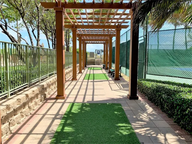 a view of swimming pool with a patio