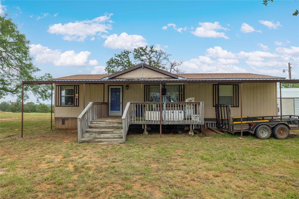 11814 County Road 266 Rochelle, TX 76872 - Photo 21 of 40 a front view of a house with a yard