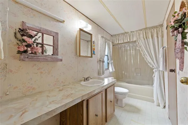 a house view with a garden space