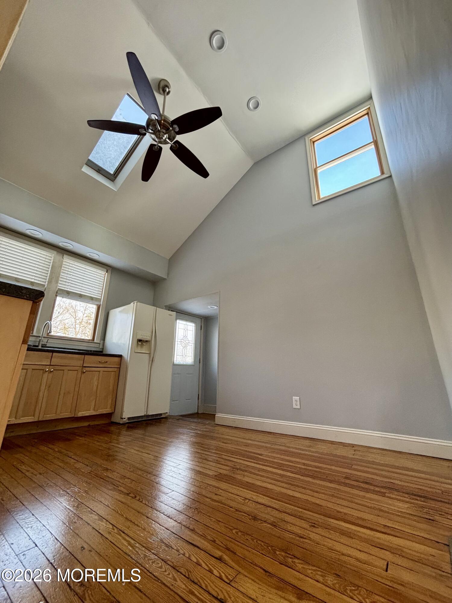 159 Bridge Avenue, Unit 1 Red Bank, NJ 07701 - Photo 20 of 22 a view of room with wooden floor and window