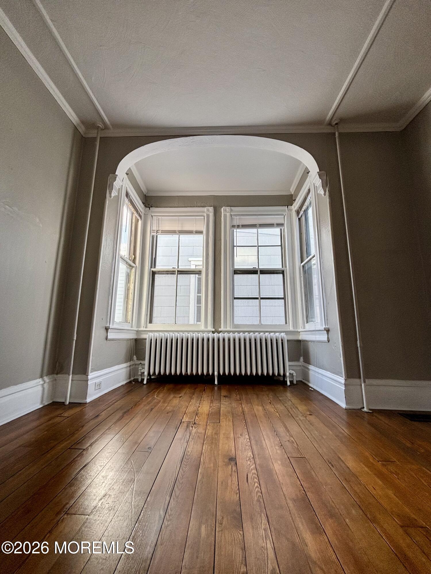 159 Bridge Avenue, Unit 1 Red Bank, NJ 07701 - Photo 2 of 22 a view of livingroom with hardwood floor and window