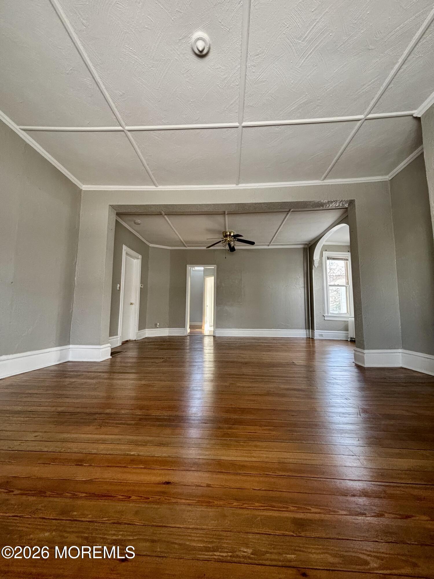 159 Bridge Avenue, Unit 1 Red Bank, NJ 07701 - Photo 22 of 22 a view of a room with wooden floor and window