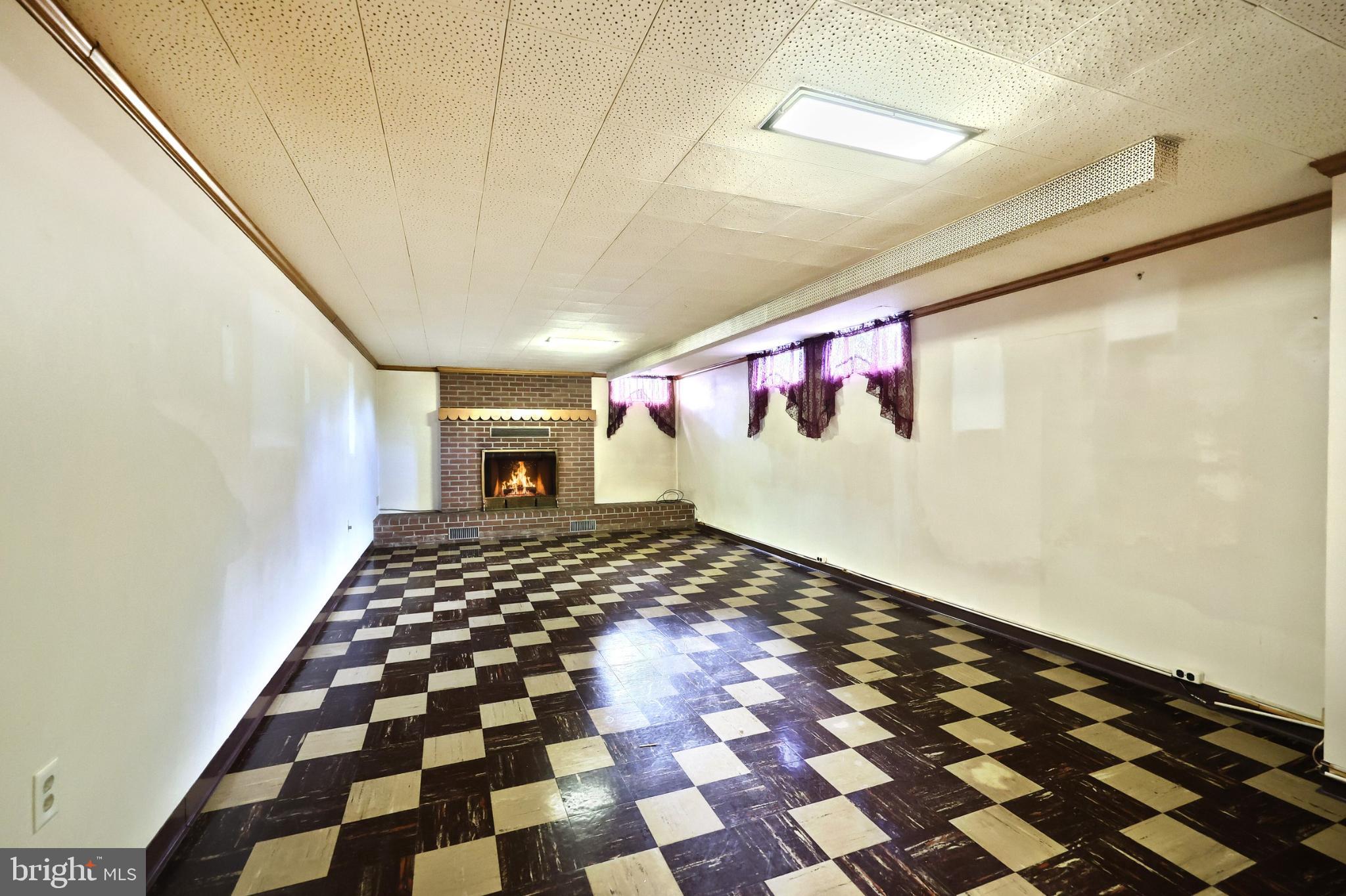 5200 Rockery Road Spring Grove, PA 17362 - Photo 27 of 45 a very nice looking room with a black and white checkered floor