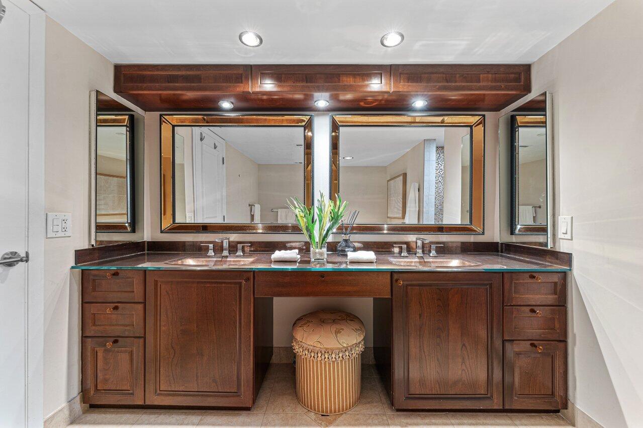 2003 North Ocean Boulevard, Unit 902 Boca Raton, FL 33431 - Photo 25 of 45 a bathroom with a sink and a mirror