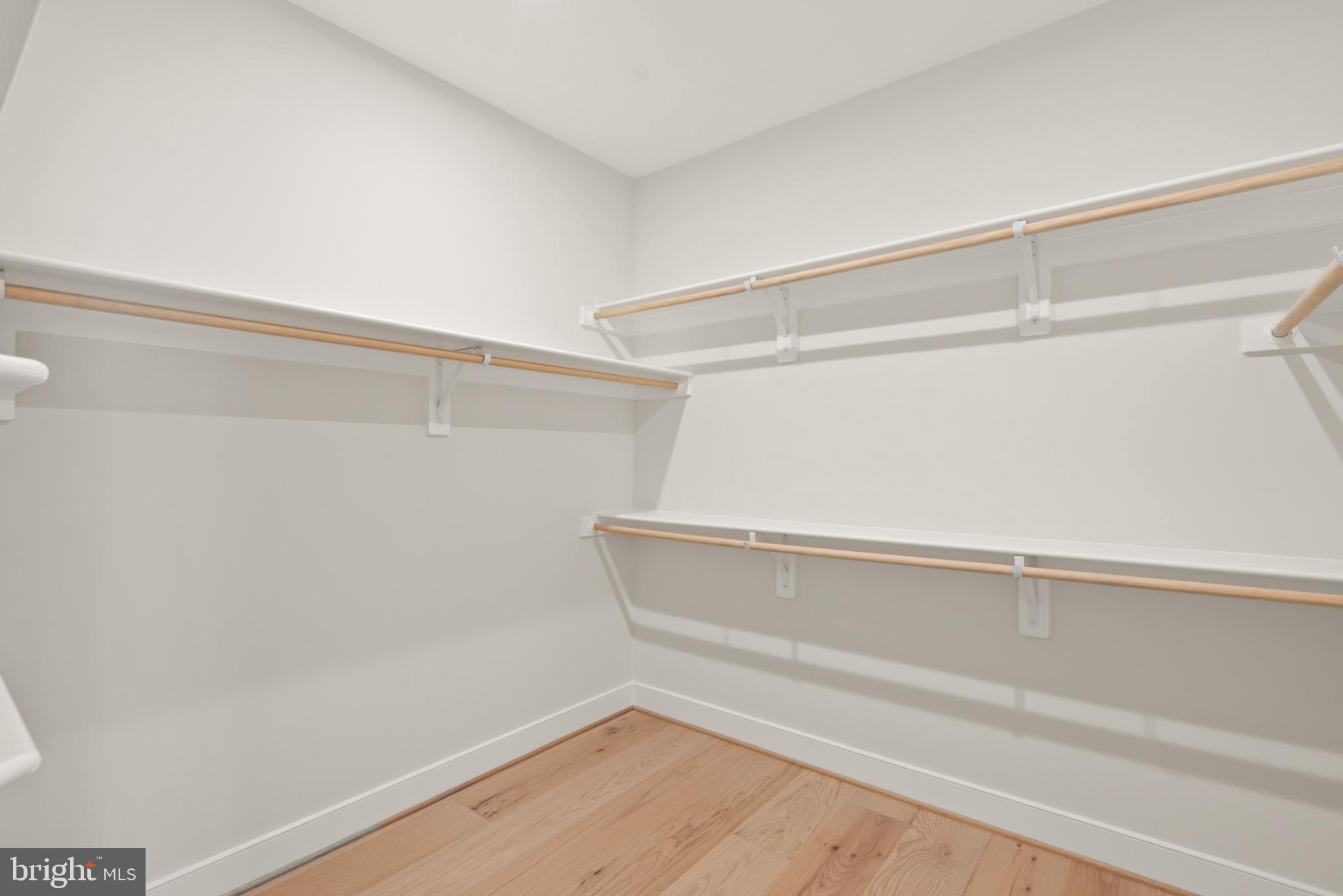 7204 Andrus Road Bethesda, MD 20817 - Photo 11 of 16 Spacious, minimalist closet ready for organizat...