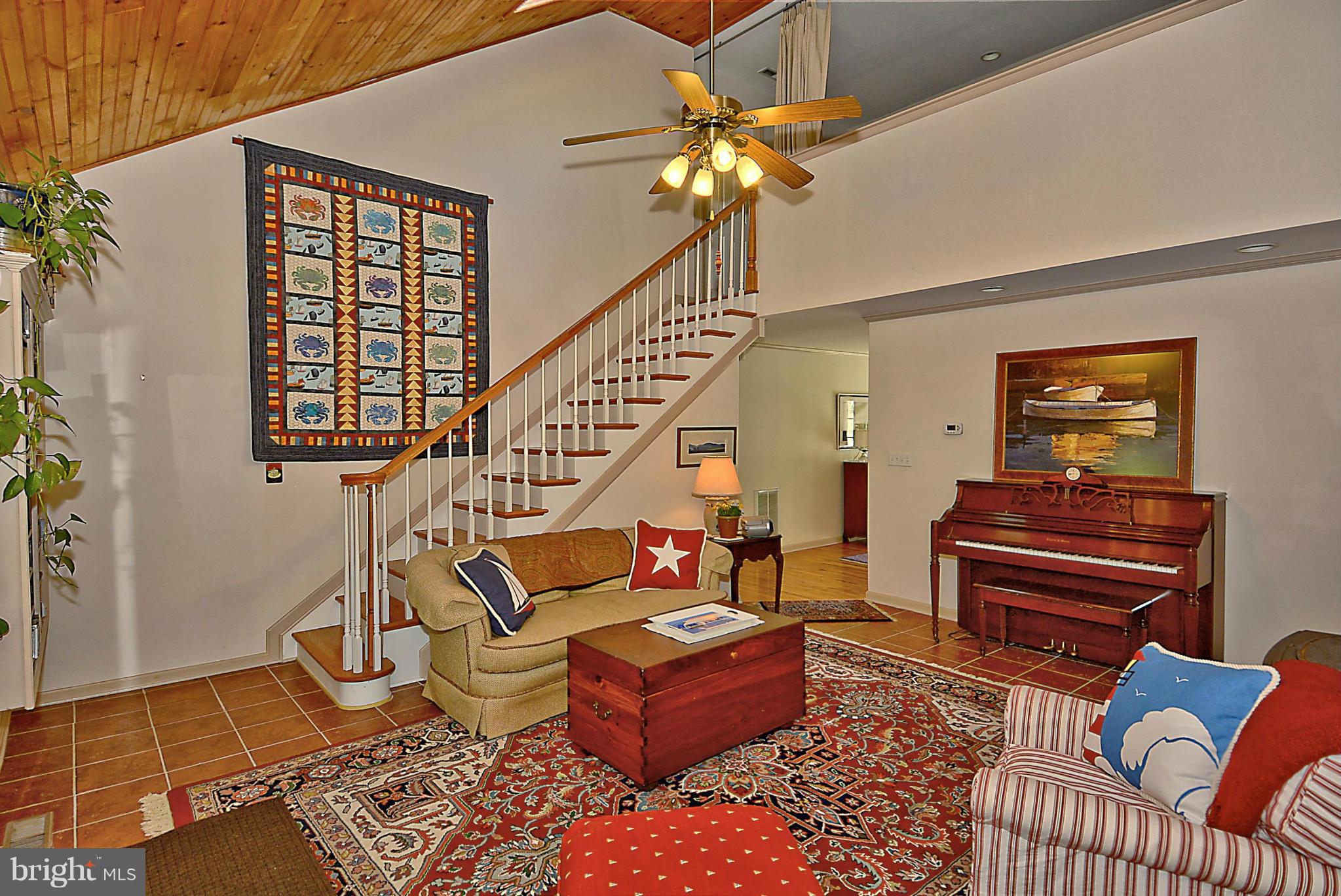 24100 Forest Pond Road St. Michaels, MD 21663 - Photo 10 of 20 a living room with furniture and a window