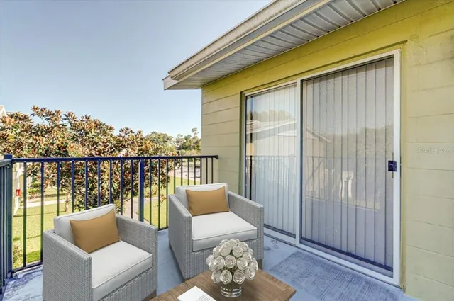 a balcony view with a couch