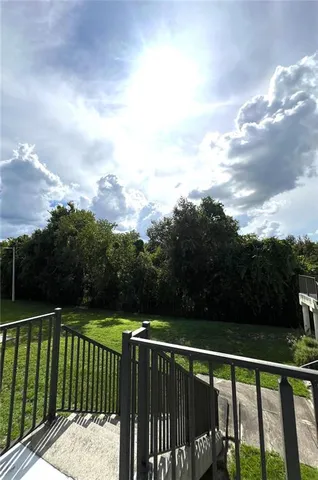 a view of city and green space