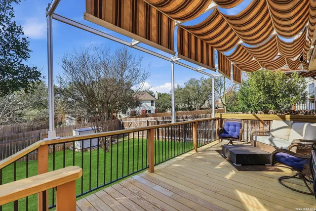 a view of a two chairs on the roof deck