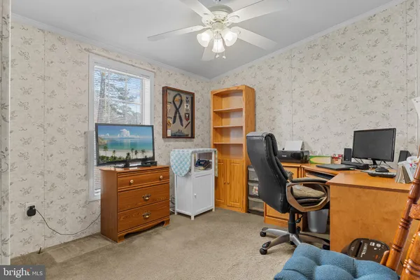 a bathroom with a sink vanity granite and a mirror