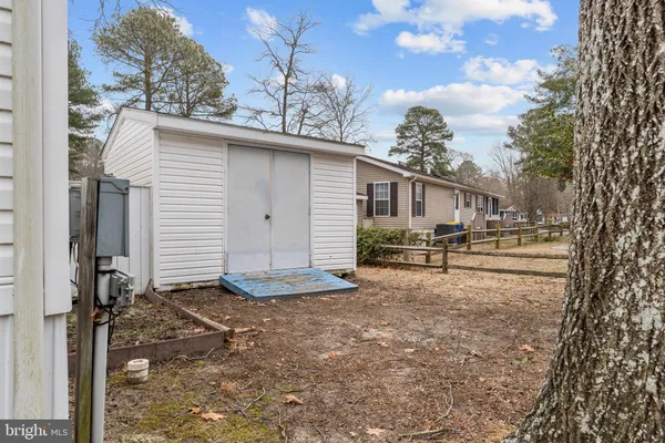 a view of a street with stores