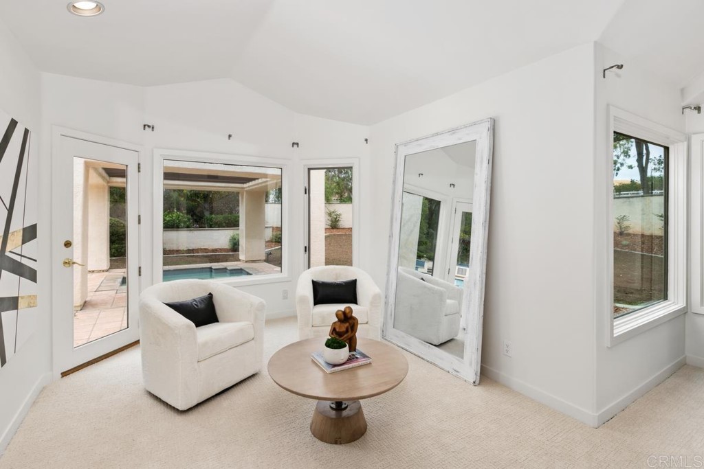 3303 Bumann Road Encinitas, CA 92024 - Photo 21 of 50 a living room with furniture and a large window