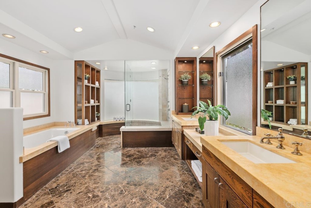 3303 Bumann Road Encinitas, CA 92024 - Photo 23 of 50 a large bathroom with a tub a sink and a large window