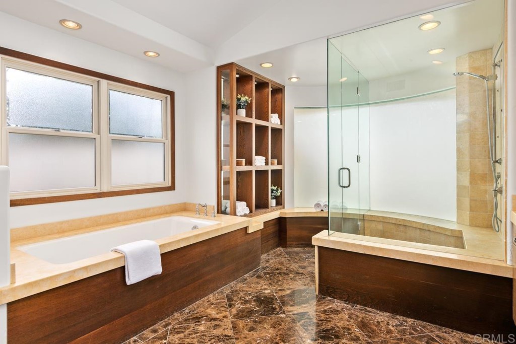 3303 Bumann Road Encinitas, CA 92024 - Photo 24 of 50 a bathroom with a large tub a sink and a shower