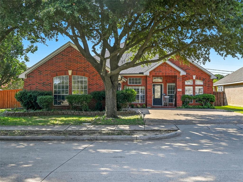 646 Huntington Lane Allen, TX 75002 - Photo 2 of 33 a front view of a house with a yard