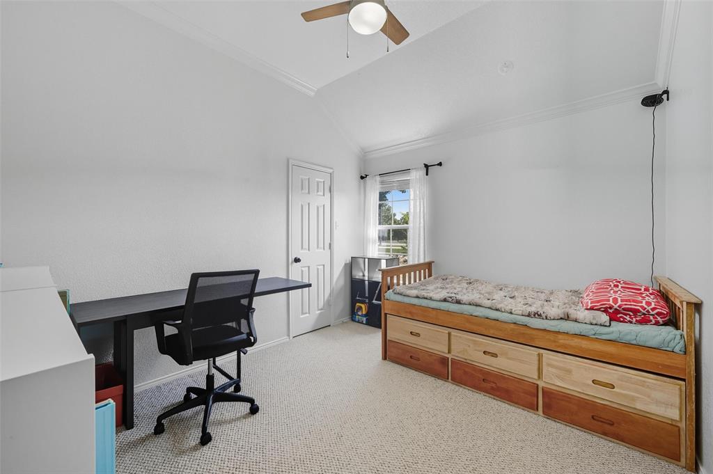 646 Huntington Lane Allen, TX 75002 - Photo 23 of 33 a bedroom with a bed and a desk