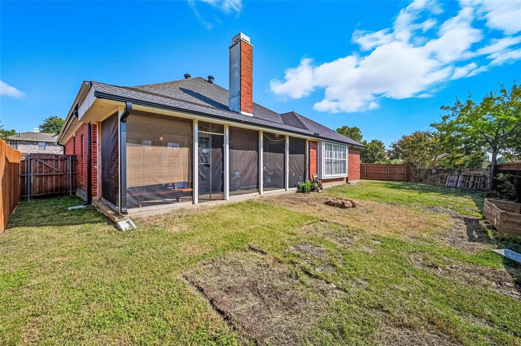 646 Huntington Lane Allen, TX 75002 - Photo 26 of 33 a view of a house with backyard and porch