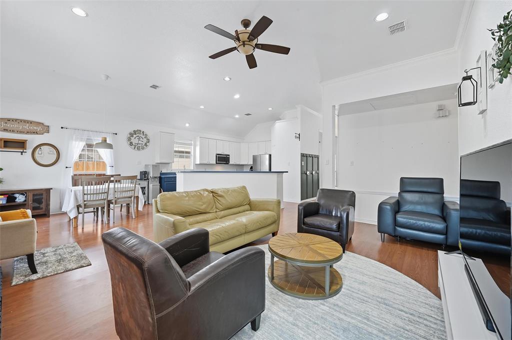 646 Huntington Lane Allen, TX 75002 - Photo 10 of 33 a living room with furniture and a wooden floor