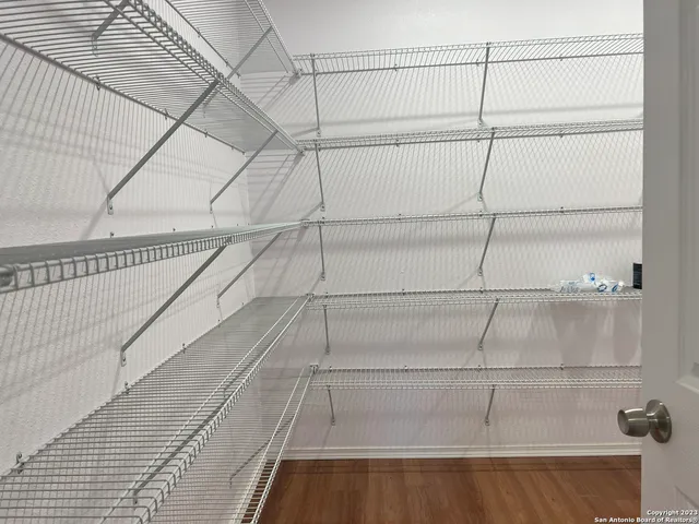 a view of an empty walk in closet