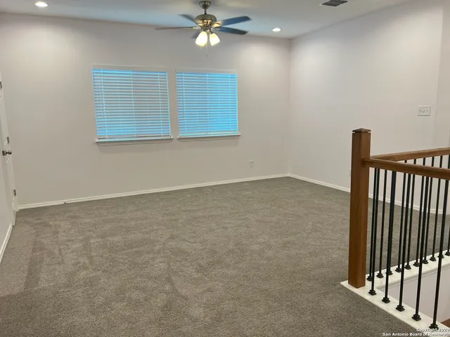 an empty room with a bathroom