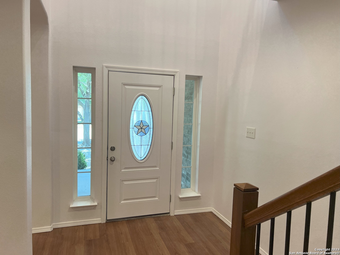 141 Wright Cove Cibolo, TX 78108 - Photo 3 of 35 a view of a hallway with wooden floor