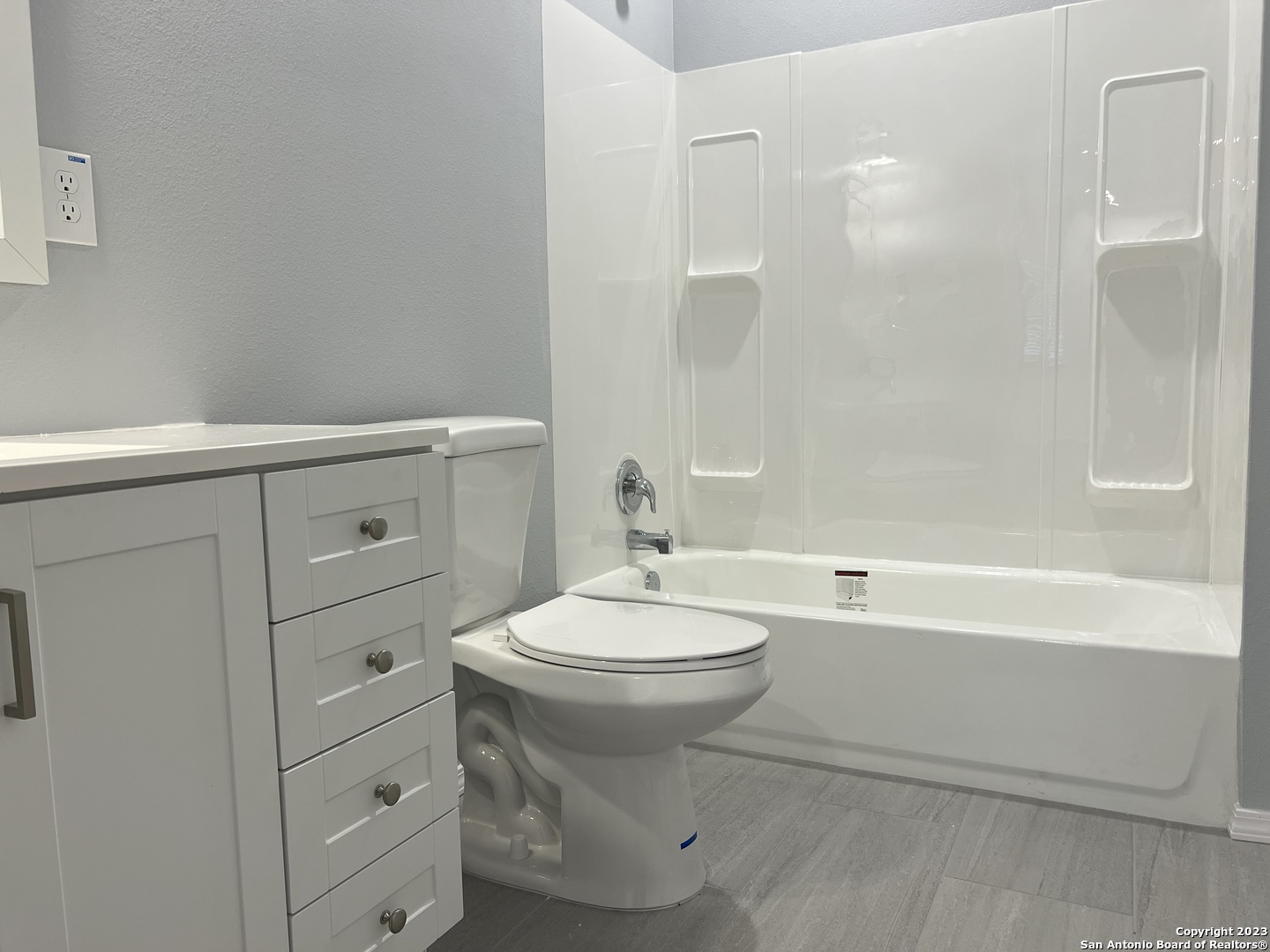 141 Wright Cove Cibolo, TX 78108 - Photo 33 of 35 a bathroom with a toilet sink vanity tub and shower