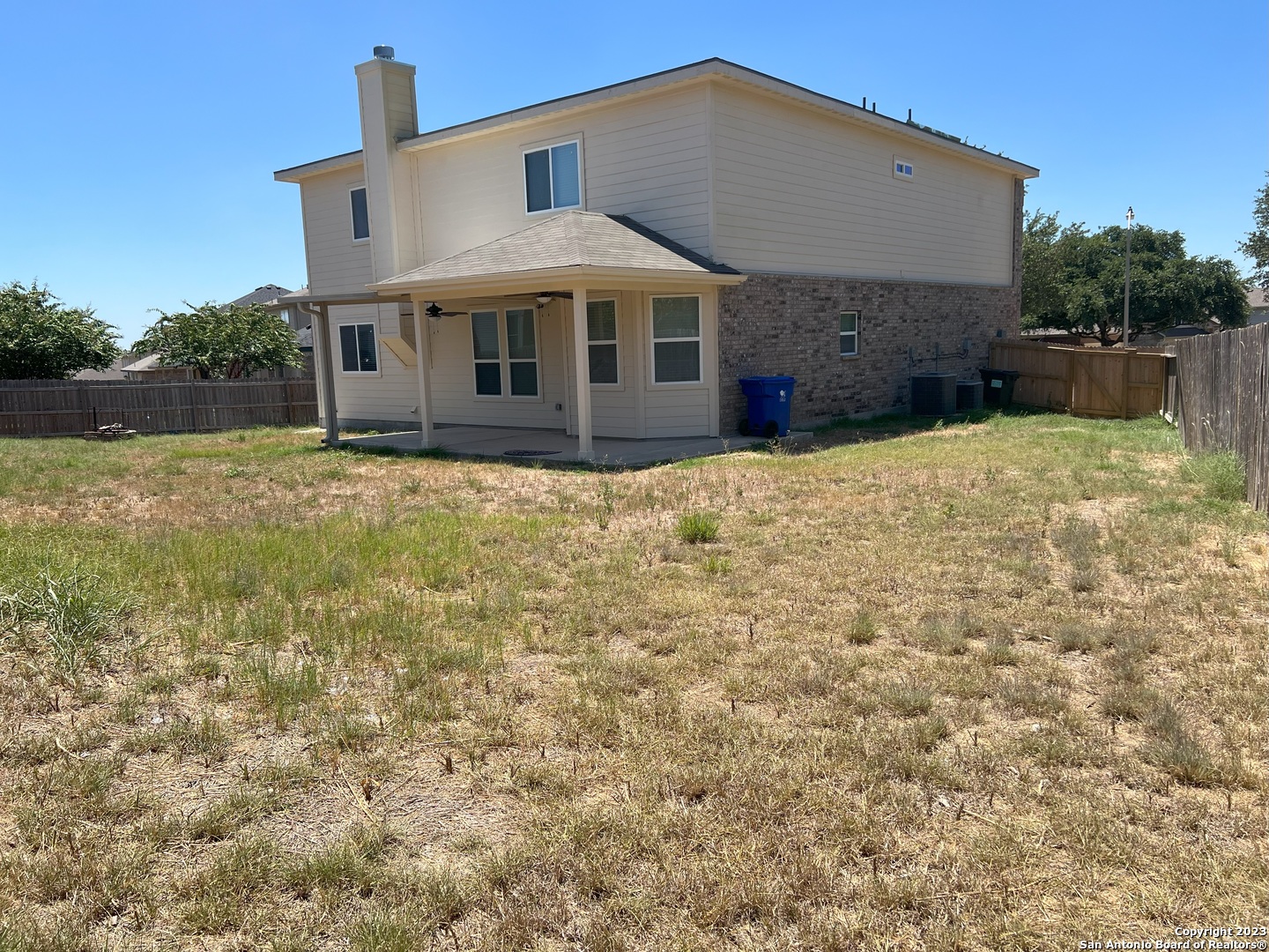 141 Wright Cove Cibolo, TX 78108 - Photo 34 of 35 a front view of a house with a yard