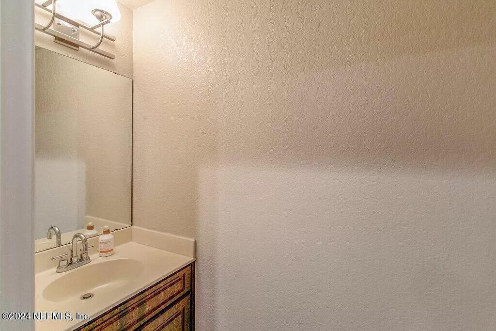 9745 Touchton Road, Unit 2724 Jacksonville, FL 32246 - Photo 13 of 22 Powder Bathroom downstairs