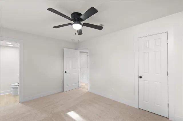 a view of a ceiling fan in a room