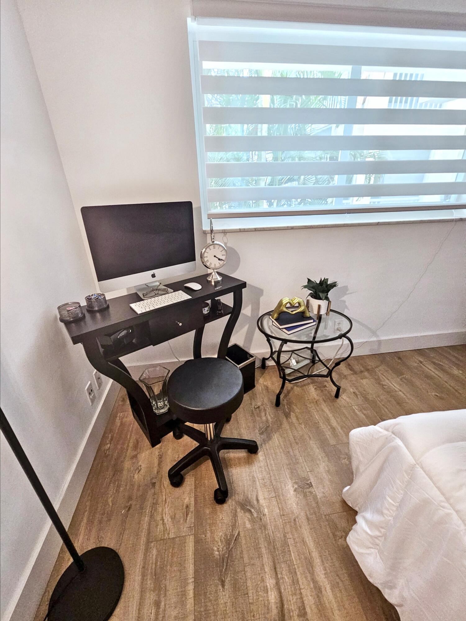 6530 North Ocean Boulevard, Unit 205 Ocean Ridge, FL 33435 - Photo 30 of 53 a workspace with furniture and wooden floor