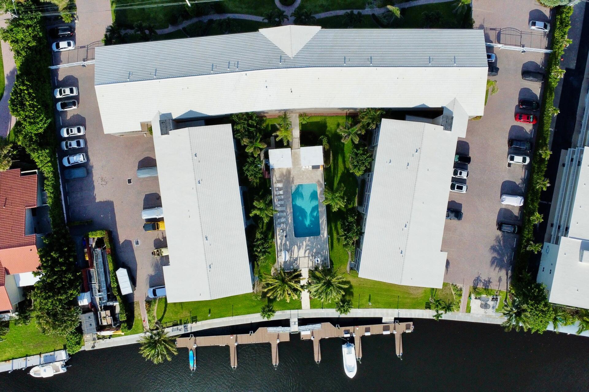 6530 North Ocean Boulevard, Unit 205 Ocean Ridge, FL 33435 - Photo 35 of 53 an aerial view of a house with yard swimming pool and outdoor seating
