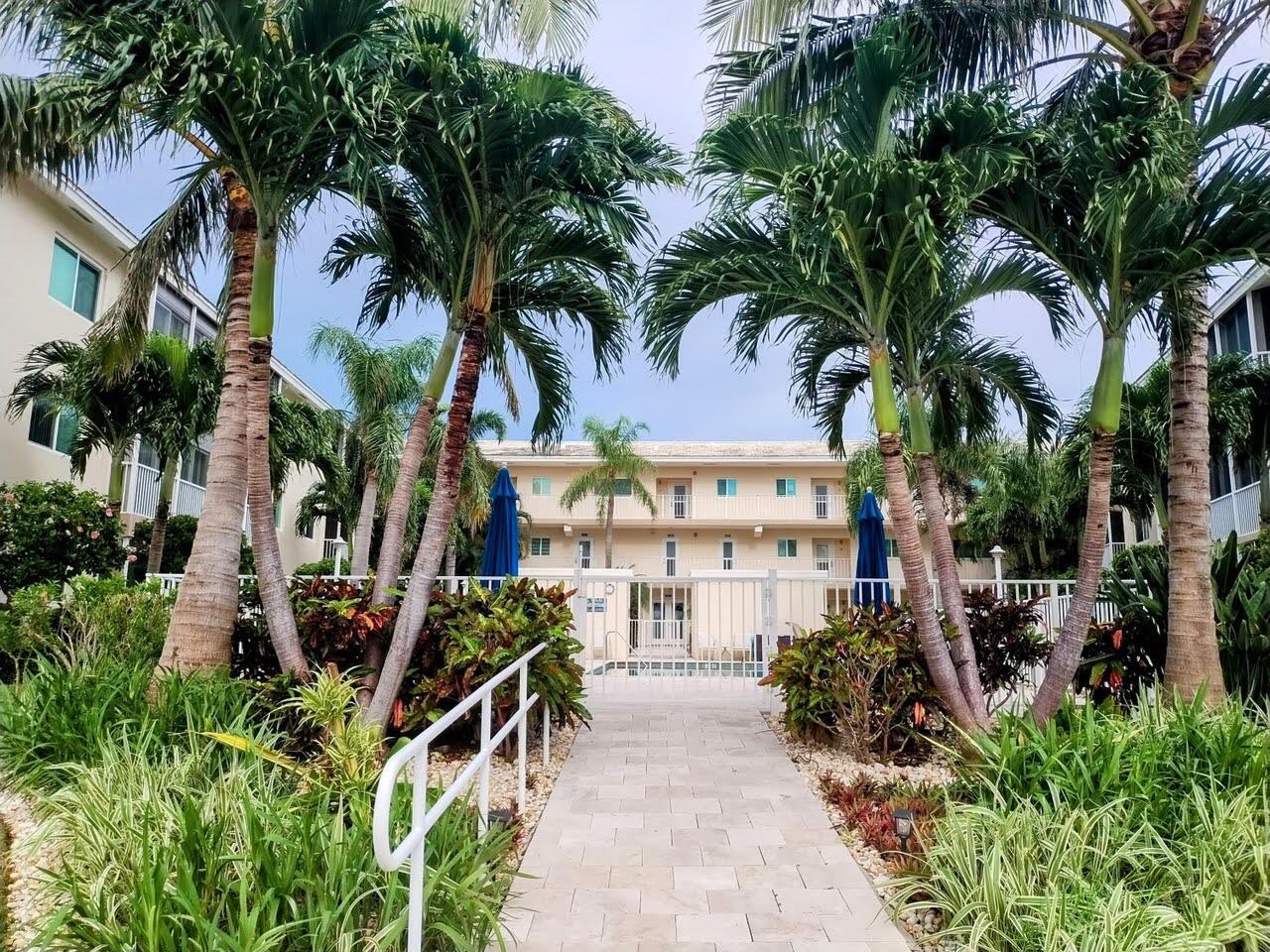 6530 North Ocean Boulevard, Unit 205 Ocean Ridge, FL 33435 - Photo 36 of 53 a view of outdoor space yard and porch